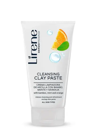 crème Nettoyante Lirène (150 ml) – Adoptez la Pâte d'Argile Visage ! Tube blanc de gel nettoyant pour le visage Lirene Cleansing Clay Paste, avec une tranche d'orange et une feuille de menthe.
