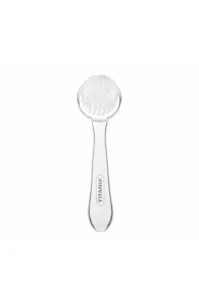 Brosse visage Titania blanche et transparente, poils doux, manche ergonomique pour peeling et nettoyage.