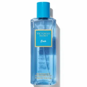 Flacon bleu Victoria's Secret Rush 250 ml avec bouchon doré, étiquette bleue et texte doré, brume parfumée élégante.