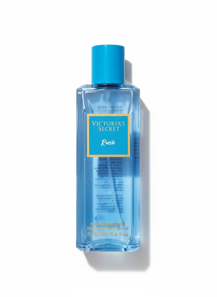 Victoria’s Secret Rush 250 ml (Brume Parfumée Femme 2025) Flacon bleu Victoria's Secret Rush 250 ml avec bouchon doré, étiquette bleue et texte doré, brume parfumée élégante.