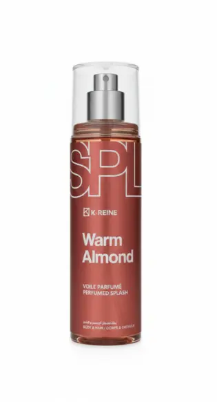 Brume K-REINE Warm Almond (120ml) : un plaisir doux ! Bouteille de brume parfumée Warm Almond de K-REINE pour les cheveux et le corps, 120ml.