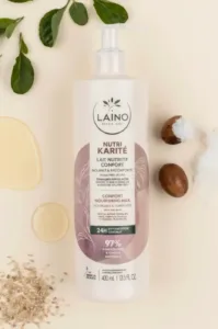 Flacon Laino Lait de Corps Karité 400 ml avec ingrédients naturels : noix de karité, feuilles vertes et lait fluide