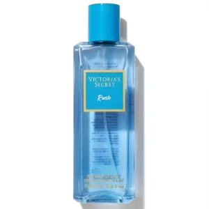 Flacon bleu Victoria's Secret Rush 250 ml avec bouchon doré, étiquette bleue et texte doré, brume parfumée élégante.