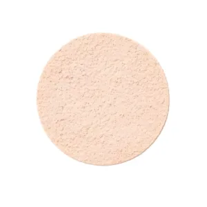 Gros plan sur la texture de la Poudre BOURJOIS HEALTHY MIX Clean & Vegan N°1 Ivory. Texture poudre libre compacte pour un teint éclatant.