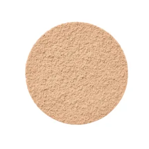 Gros plan sur la texture de la poudre compacte Bourjois Healthy Mix Clean Powder n°4 Beige Doré sur fond blanc.