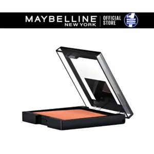 Blush Maybelline Fit Me 35 Corail, boîtier noir ouvert en biais, révélant la poudre corail lisse. Logo Maybelline New York en haut.