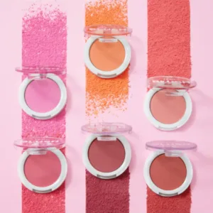 Les six teintes de blush HEAN BLUSH BABY disposées en deux rangées de trois sur un fond rose avec les swatches poudre en arrière-plan.