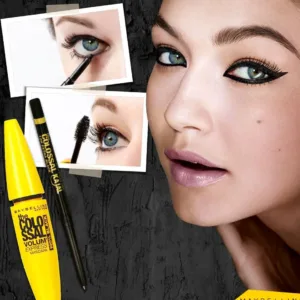 Mannequin avec un smoky eye intense au Colossal Kajal Extra Black et Mascara Volum' Express pour un volume colossal.