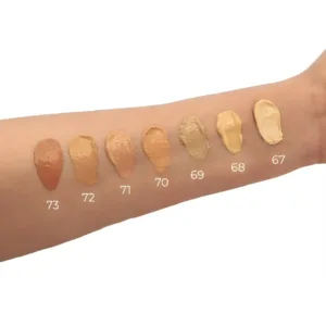 Swatches sur bras des teintes 67 à 73 du fond de teint Yves Morel All In One, montrant les nuances claires à médiums.
