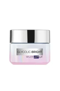 Crème de nuit L'Oréal Paris Glycolic-Bright dans un pot en verre irisé aux reflets roses et argentés, format 50ml.
