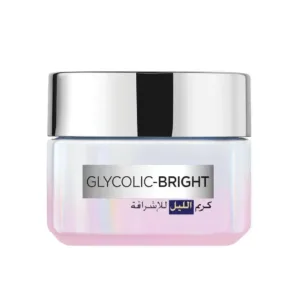 Crème de nuit L'Oréal Paris Glycolic-Bright dans un pot en verre irisé aux reflets roses et argentés, format 50ml.