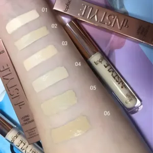 Échantillons de teintes 01 à 06 du correcteur Topface InStyle appliqués sur la peau pour comparer les nuances.