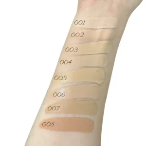 Swatches des teintes 001 à 008 du fond de teint Topface Skin Twin sur un avant-bras pour comparer les carnations.