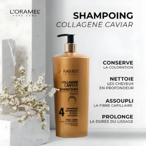Flacon doré de shampoing L'Oramel Collagène Caviar 700ml posé près de fleurs blanches, illustrant un soin capillaire premium.