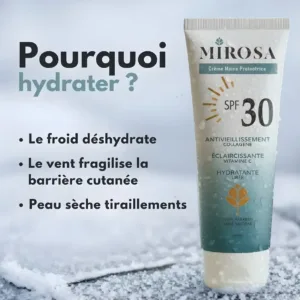 Tube de crème MIROSA SPF 30 posé dans la neige avec texte expliquant les bienfaits de l'hydratation contre le froid.