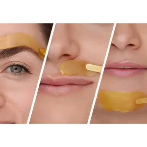 Application précise de cire tiède sur le visage : sourcils, lèvre supérieure et menton pour un résultat net.