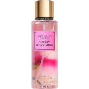 Flacon transparent de brume parfumée Victoria's Secret Cherry Blossoming 250ml avec fleurs roses et bouchon doré.