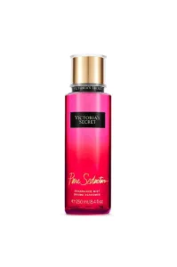 Flacon rose de brume parfumée Pure Seduction de Victoria's Secret, 250 ml, avec bouchon doré sur fond blanc épuré.