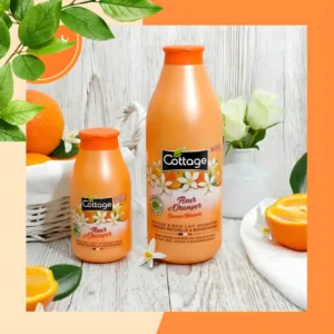 Flacons Cottage Fleur d'Oranger sur bois blanc avec oranges fraîches. Soin hydratant 97% d'origine naturelle.