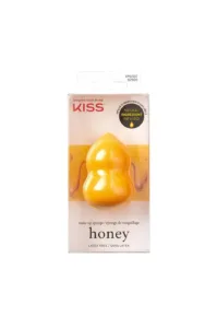 Éponge de maquillage KISS infusée au miel, sans latex, en forme de goutte pour une application précise et un fini naturel.