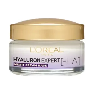 Pot en verre de crème masque de nuit L'Oréal Hyaluron Expert avec couvercle doré sur fond blanc pur.