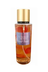 Flacon cylindrique transparent de la brume parfumée pour le corps Velvet Petals de Victoria's Secret avec bouchon doré.